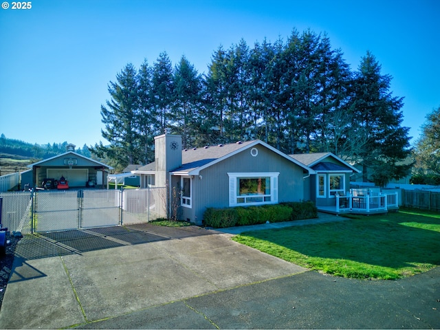 ranch-style home featuring a garage and a front lawn