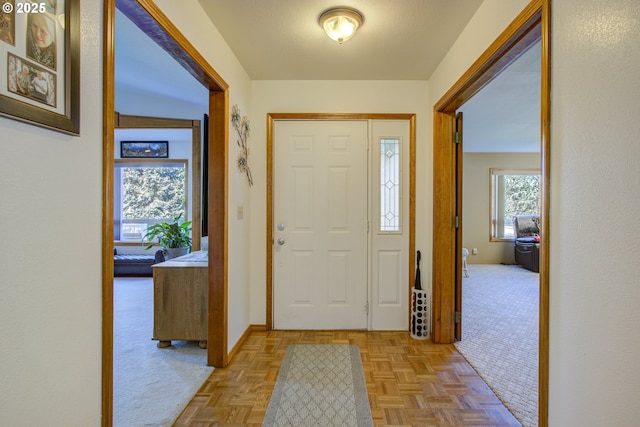 foyer featuring light parquet flooring