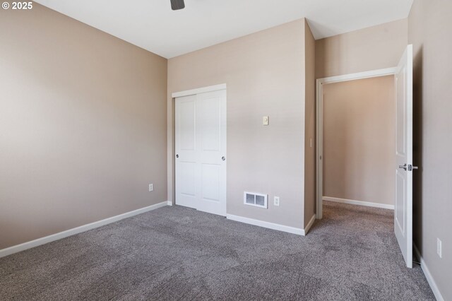 8712 N Decatur St Unit 302, Portland, OR 97203 - unfurnished bedroom featuring carpet, baseboards, and ceiling fan