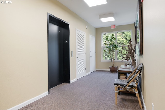 8712 N Decatur St Unit 302, Portland, OR 97203 - hallway with carpet floors, baseboards, and elevator