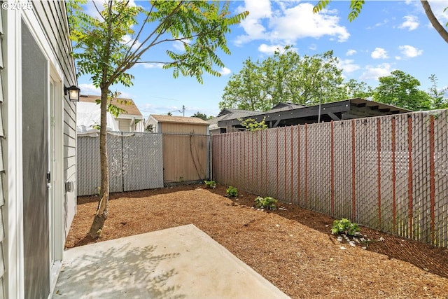 8316 SE Raymond Ct, Portland, OR 97266 - fenced backyard featuring a patio area
