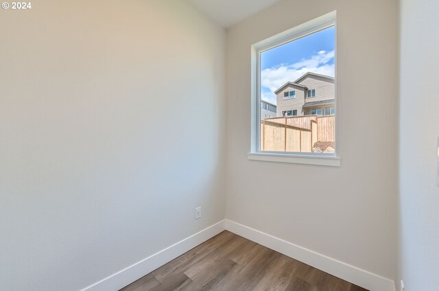 empty room featuring hardwood / wood-style floors