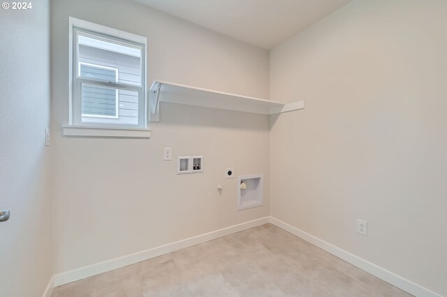 clothes washing area with washer hookup, hookup for a gas dryer, and hookup for an electric dryer