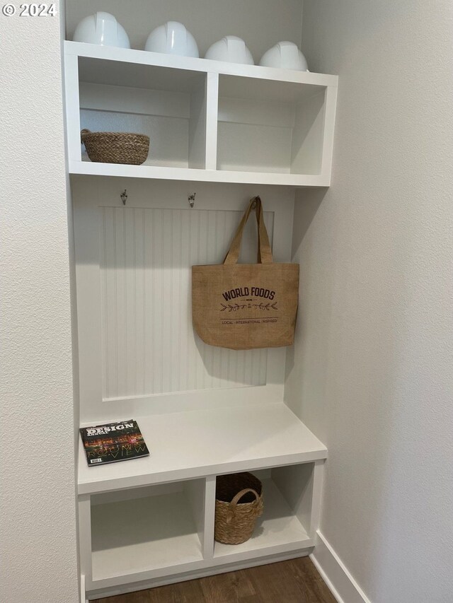 mudroom with dark hardwood / wood-style floors