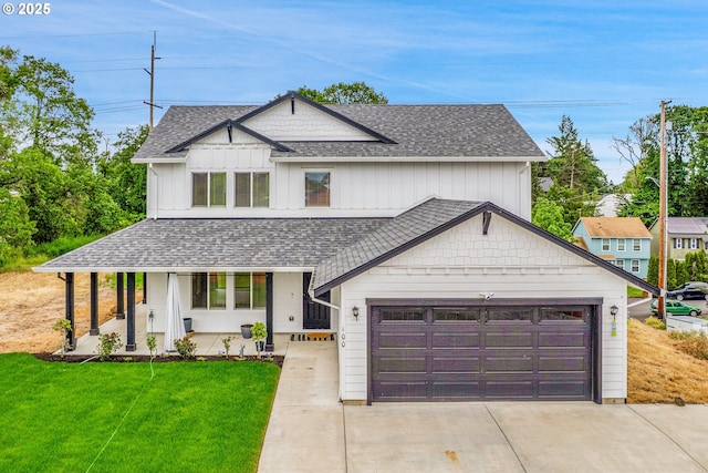 100 Running Dogs Ln, Saint Helens, OR 97051 - modern inspired farmhouse featuring covered porch, a front lawn, concrete driveway, an attached garage, and a shingled roof