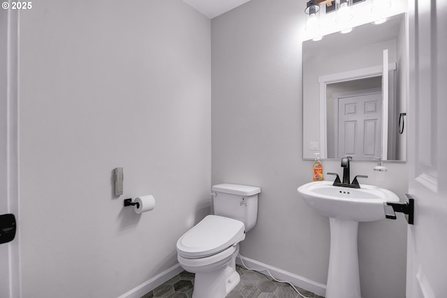 100 Running Dogs Ln, Saint Helens, OR 97051 - bathroom featuring toilet and baseboards