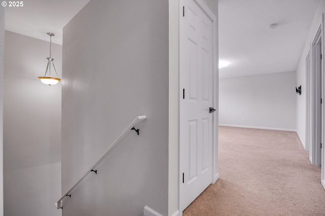 100 Running Dogs Ln, Saint Helens, OR 97051 - hallway featuring an upstairs landing, light colored carpet, and baseboards