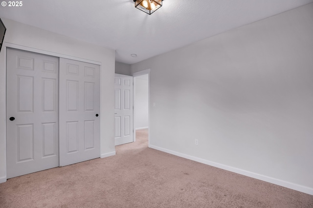 100 Running Dogs Ln, Saint Helens, OR 97051 - unfurnished bedroom with carpet, baseboards, and a closet