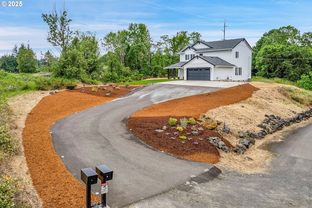 100 Running Dogs Ln, Saint Helens, OR 97051 - view of front of property featuring asphalt driveway and an attached garage