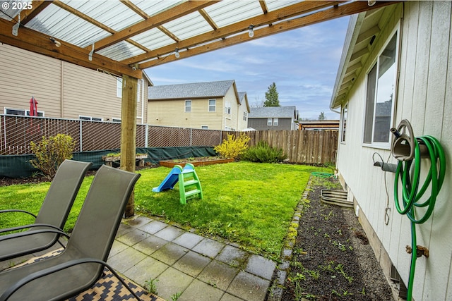 view of yard with a patio and a fenced backyard