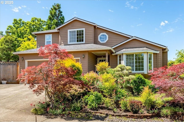 5249 NW 173rd Pl, Portland, OR 97229 - traditional-style home featuring an attached garage and concrete driveway