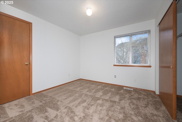 5249 NW 173rd Pl, Portland, OR 97229 - unfurnished bedroom with carpet flooring and baseboards