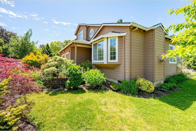 5249 NW 173rd Pl, Portland, OR 97229 - view of side of property featuring a yard