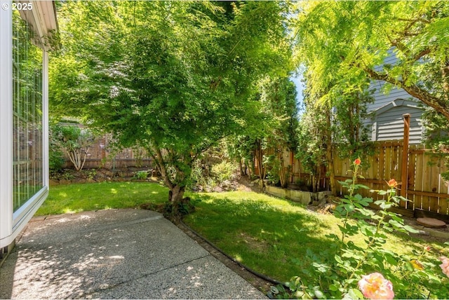 5249 NW 173rd Pl, Portland, OR 97229 - fenced backyard with a patio area
