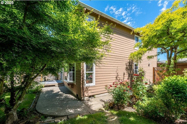 5249 NW 173rd Pl, Portland, OR 97229 - view of side of home featuring a wooden deck