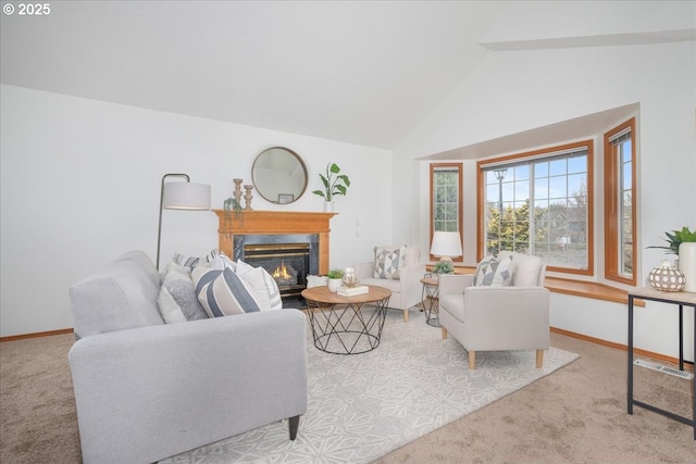 5249 NW 173rd Pl, Portland, OR 97229 - carpeted living room featuring vaulted ceiling and a fireplace