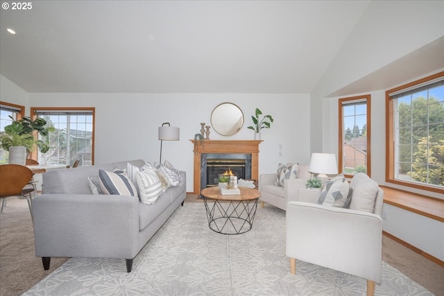 5249 NW 173rd Pl, Portland, OR 97229 - living room with lofted ceiling, carpet floors, a premium fireplace, and recessed lighting