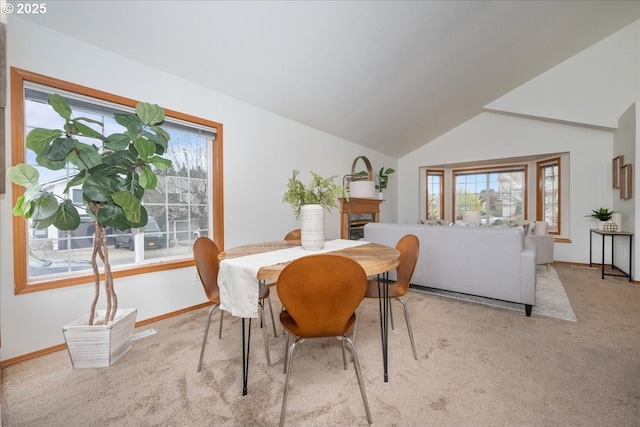 5249 NW 173rd Pl, Portland, OR 97229 - carpeted dining area featuring baseboards and lofted ceiling