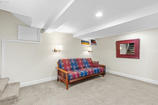 carpeted living room featuring baseboards and recessed lighting
