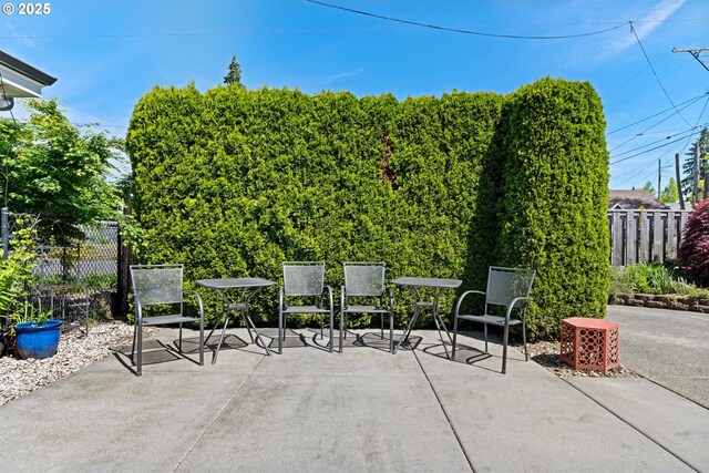 view of patio with fence