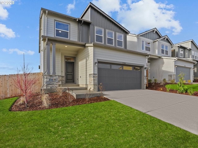 view of front facade with a garage and a front lawn