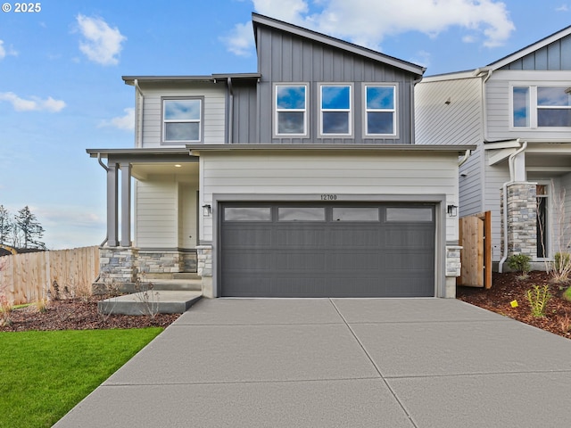 view of front of property with a garage