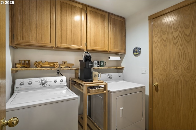 17692 Rogue Ln, Sunriver, OR 97707 - laundry room with washing machine and dryer and cabinet space