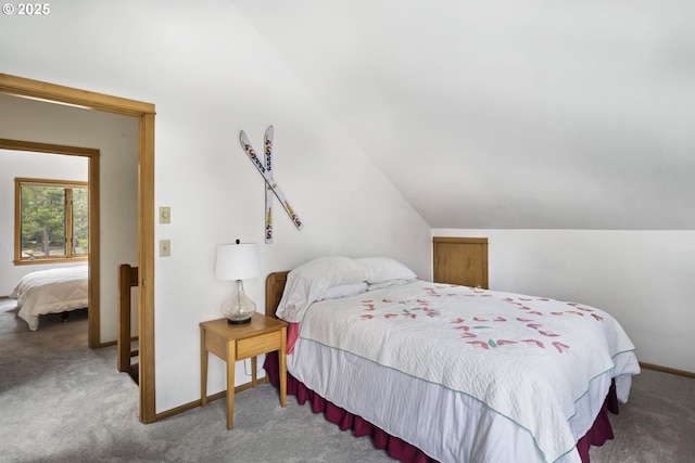 17692 Rogue Ln, Sunriver, OR 97707 - carpeted bedroom with vaulted ceiling and baseboards