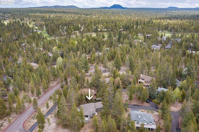 17692 Rogue Ln, Sunriver, OR 97707 - aerial view of property and surrounding area featuring a forest and mountains