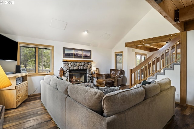 17692 Rogue Ln, Sunriver, OR 97707 - living area featuring plenty of natural light, dark wood-style flooring, a fireplace, lofted ceiling, and baseboards