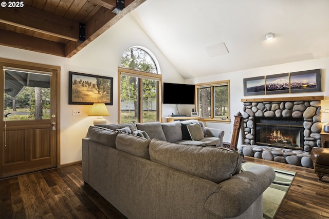 17692 Rogue Ln, Sunriver, OR 97707 - living area with dark wood-type flooring, a stone fireplace, and baseboards