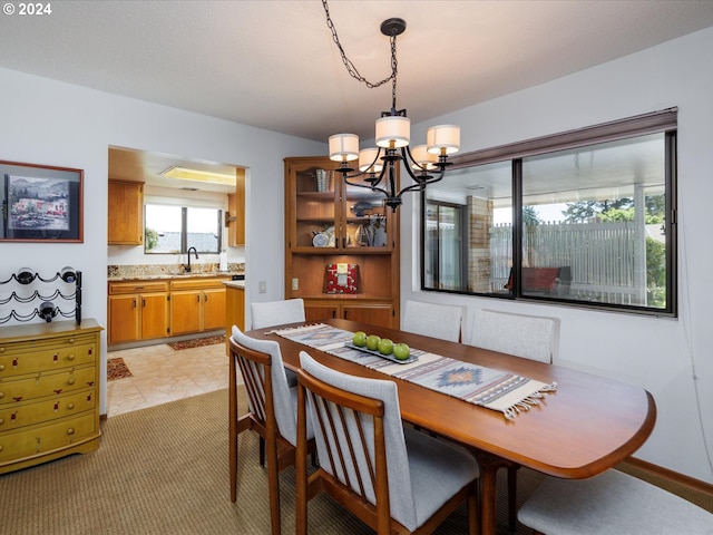 dining area featuring an inviting chandelier