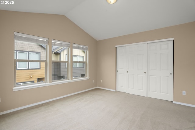 1544 SW 175th Ave, Beaverton, OR 97003 - unfurnished bedroom featuring lofted ceiling, carpet floors, a closet, and baseboards