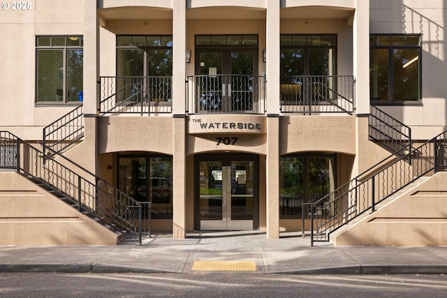 707 N Hayden Island Dr Unit 415, Portland, OR 97217 - entrance to property featuring french doors and stucco siding