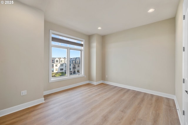 707 N Hayden Island Dr Unit 415, Portland, OR 97217 - spare room featuring light wood-style floors and recessed lighting