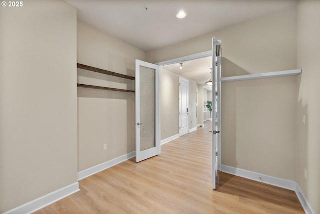 707 N Hayden Island Dr Unit 415, Portland, OR 97217 - unfurnished bedroom featuring light wood-style flooring and recessed lighting
