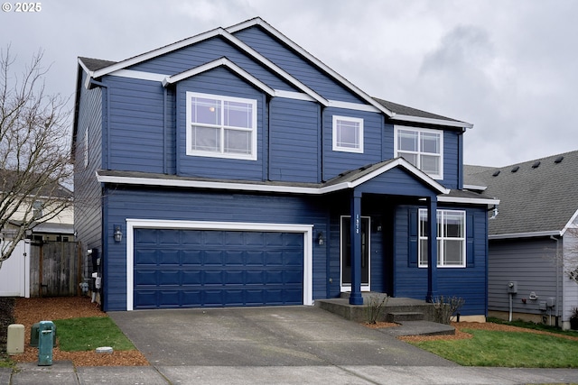 traditional-style home featuring driveway and a garage