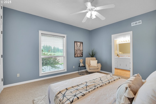 3270 N Maple St, Canby, OR 97013 - bedroom featuring carpet flooring, baseboards, connected bathroom, and a ceiling fan