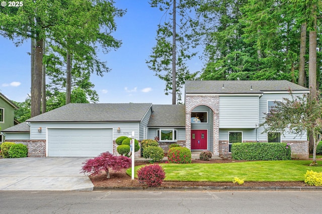 3270 N Maple St, Canby, OR 97013 - view of front of home with an attached garage, concrete driveway, a front yard, and brick siding