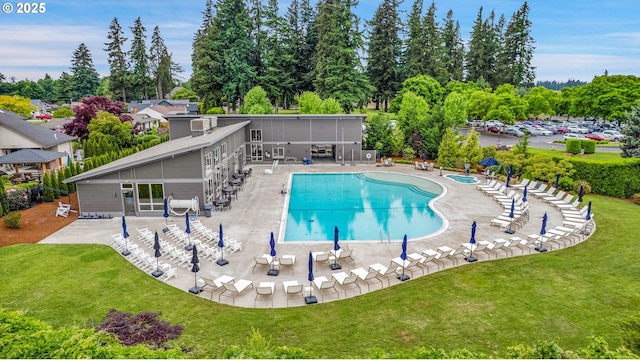 3270 N Maple St, Canby, OR 97013 - community pool featuring a yard, a patio, and view of scattered trees