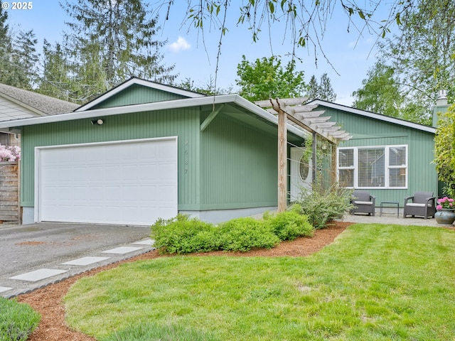 ranch-style house with a garage, a pergola, driveway, and a front yard