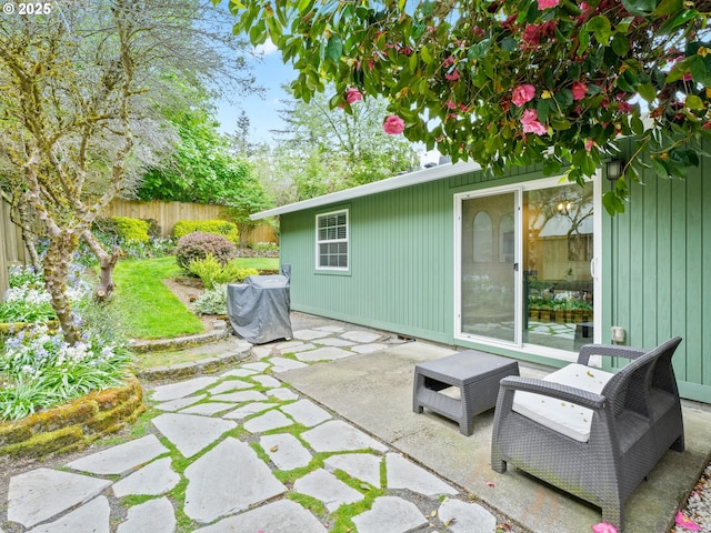 view of patio / terrace featuring fence