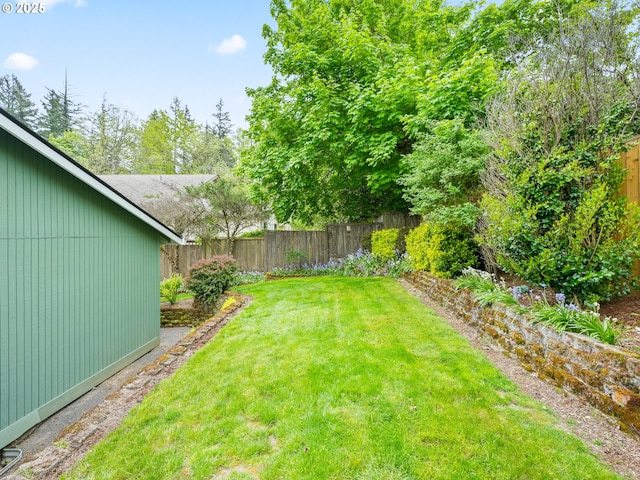 view of yard featuring a fenced backyard