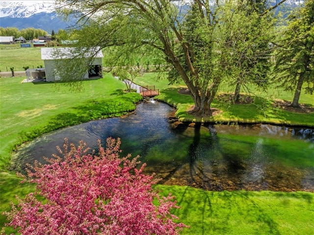 65155 Hurricane Creek Rd, Enterprise, OR 97828 - view of grassy yard with a water view