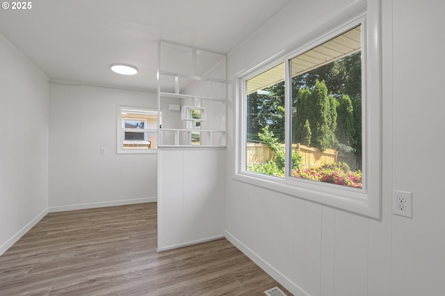 116 SE 153rd Ave, Portland, OR 97233 - unfurnished dining area with wood finished floors and baseboards