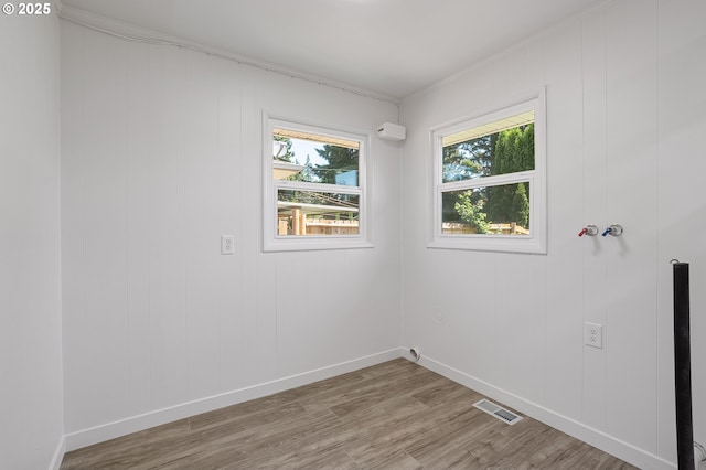 116 SE 153rd Ave, Portland, OR 97233 - spare room featuring wood finished floors and baseboards