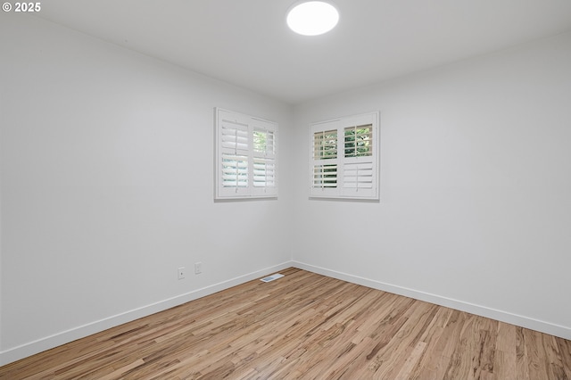 116 SE 153rd Ave, Portland, OR 97233 - empty room featuring light wood-type flooring and baseboards