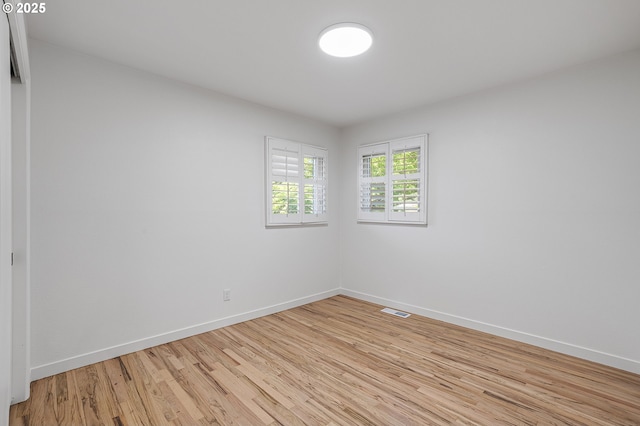 116 SE 153rd Ave, Portland, OR 97233 - empty room with light wood-style flooring and baseboards