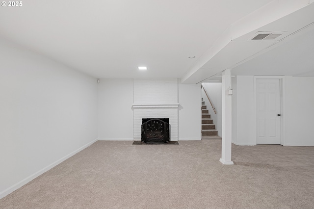 116 SE 153rd Ave, Portland, OR 97233 - unfurnished living room with carpet flooring, a fireplace, stairway, and baseboards