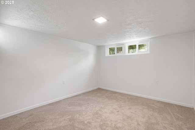 116 SE 153rd Ave, Portland, OR 97233 - carpeted empty room featuring a textured ceiling and baseboards